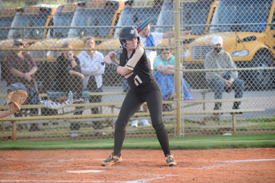 Sophomore Catie Lovelace waits for the perfect pitch in a game against St. James.