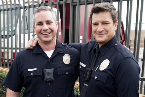 Nathan Fillion with William Norcross, the real-life cop who inspired The Rookie.