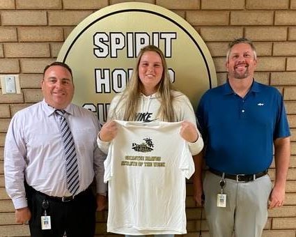 Anna Reese Pratt receives an Athlete of the Week shirt from Principal Mr. Jeremy Rich and Athletic Director Mr. Josh Vinson.