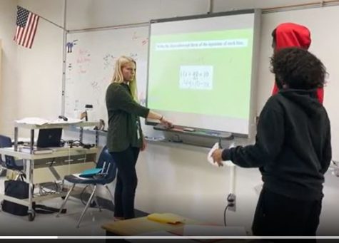 Intern Ms. Urbaniak teaches a math lesson in Mr. Mook's class. She has been hired to teach fulltime in the next school year.