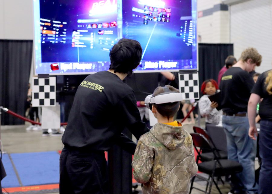 Gaming Guild members teach young students about esports at the Horry County Schools Tech Fair.