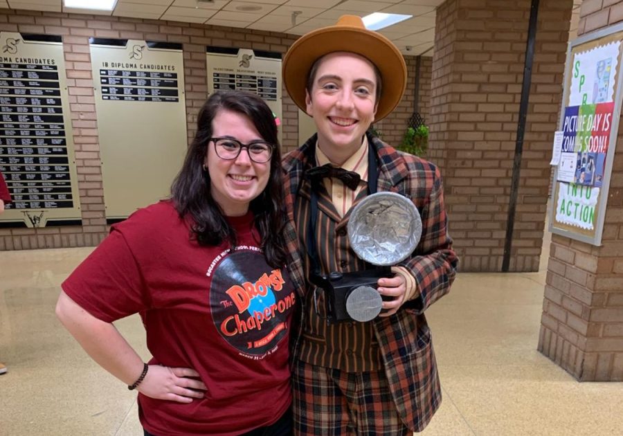Drama I Long-term Substitute Ms. Delvecchio poses with Kai Marks after a performance of The Drowsy Chaperone, while serving as the productions Technical  Producer. 