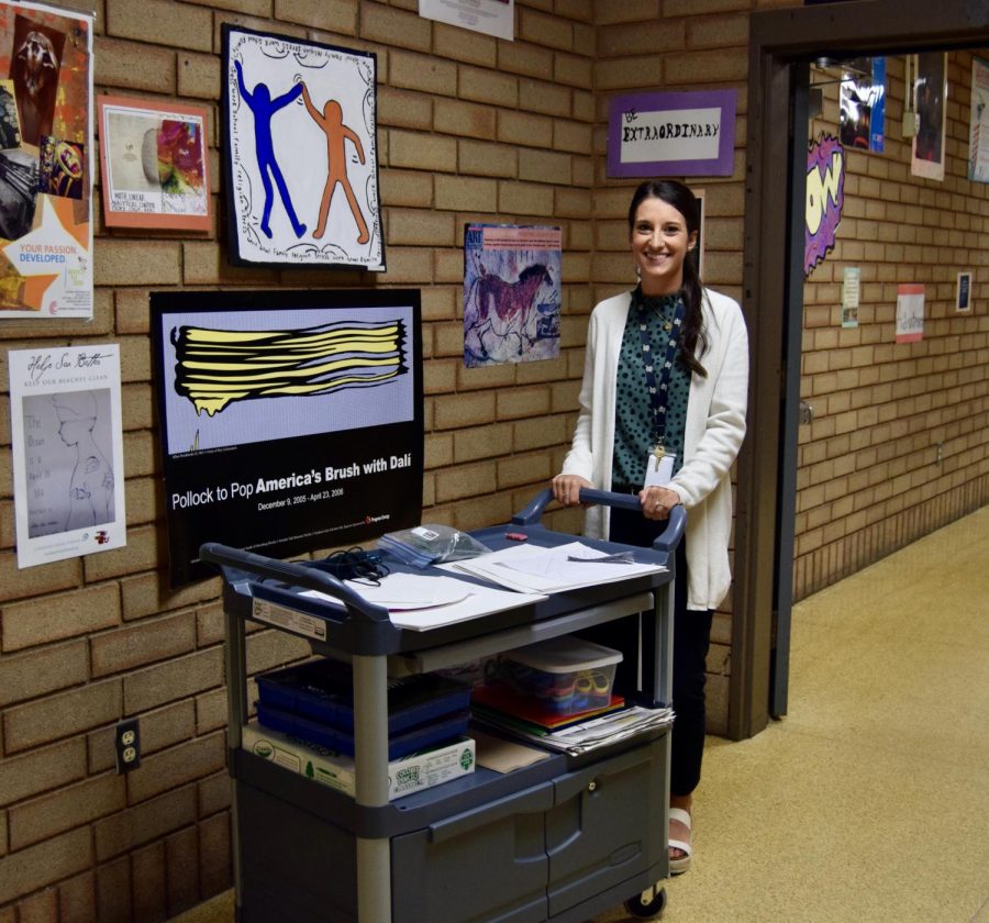 New Art Teacher Mrs. Heinrich uses a cart to float between classes.