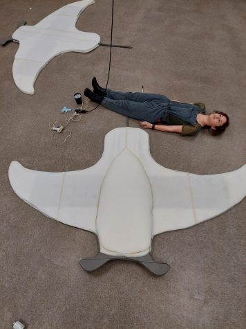 Theatre Tech member Bella McGlone works on creating part of the set of The Little Mermaid.