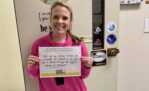 Guidance Counselor Ms. Brittany Belcher poses for a Facebook post for National Guidance Counselors Week.