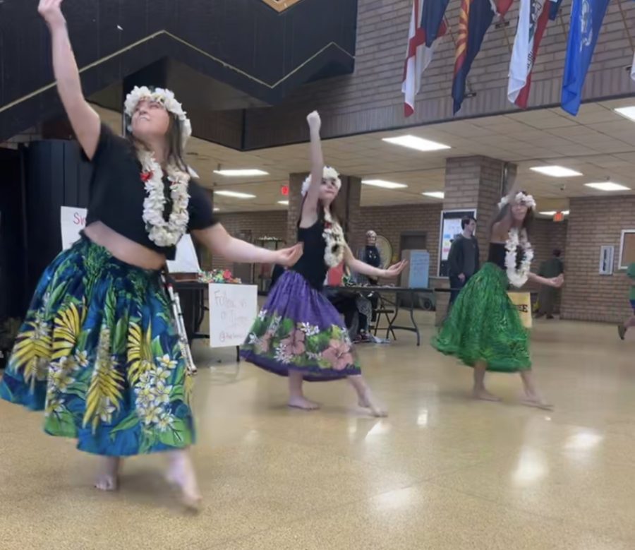 Hawaiian dancers perform during lunches to introduce a new club that will teach about Polynesian culture.