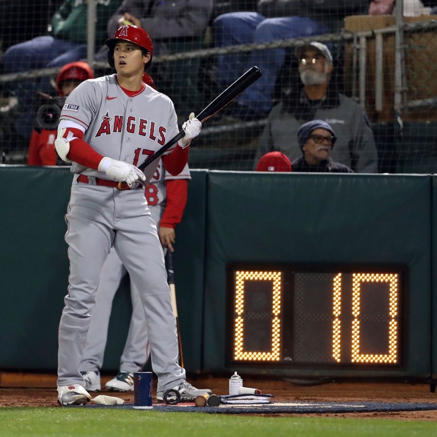 Los Angeles Angels star Shohei Ohtani standing next to MLBs pitch clock (Photo: Scott Strazzante/San Francisco Chronicle)