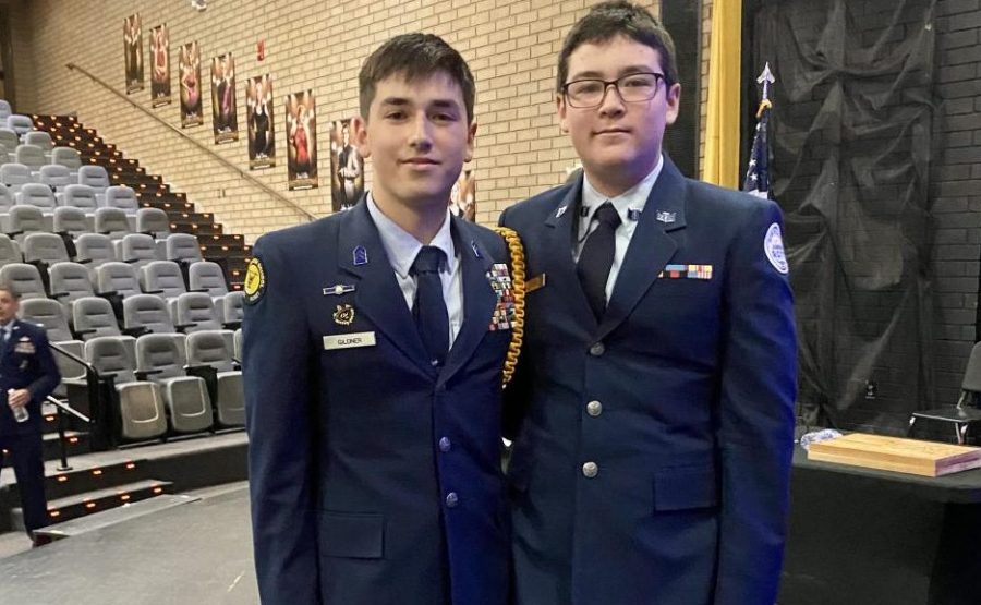 Senior Ethan Gildner and his brother Freshman Ben Gildner pose for a picture after a JROTC event. 