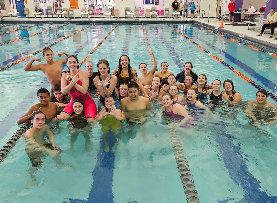 The+mens+and+womens+swim+teams+pose+for+a+photo+after+the+women+wone+5A+Regionals+on+Oct.+7+at+North+Myrtle+Beach.