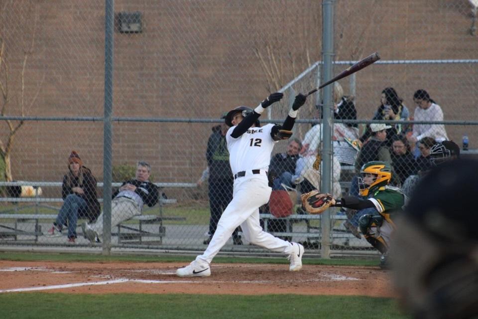 Chone James(12) bats against Conway