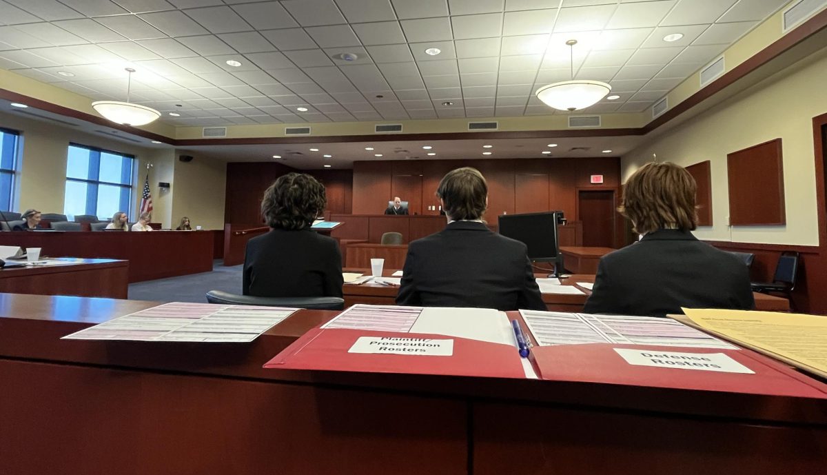 Rebecca+Norton+Baker+and+other+members+of+the+Mock+Trial+team+participate+in+a+case.