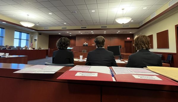 Rebecca Norton Baker and other members of the Mock Trial team participate in a case.