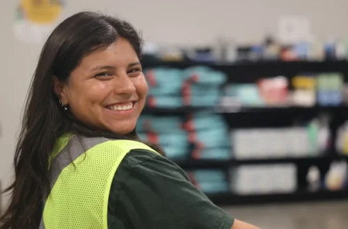 Volunteers and community partners support a food drive to stock school pantries in Tampa Bay